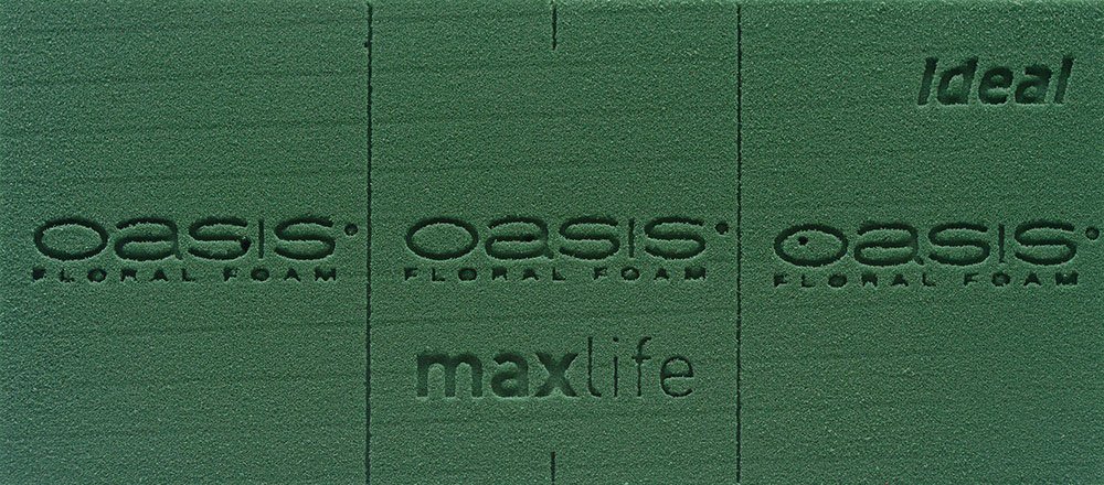 Gąbka florystyczna produkcji firmy Oasis®, przeznaczona do kwiatów żywych, rodzaj - Oasis® Ideal z formulą Maxlife, kolor - zielona
