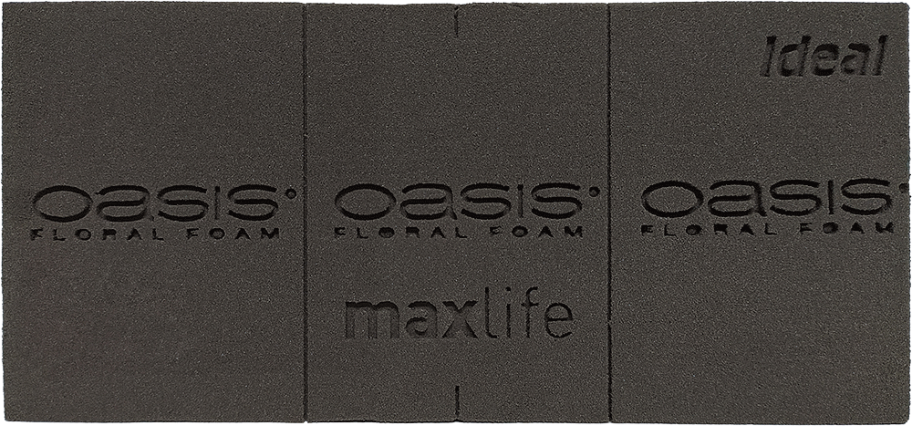 Gąbka florystyczna produkcji firmy Oasis®, przeznaczona do kwiatów żywych, rodzaj - Oasis® BLACK Ideal z formulą Maxlife, kolor - czarna